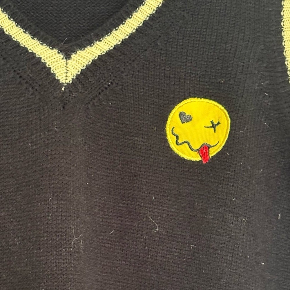 Cute black sweater vest with a winky, tongue-out sweater vest -S
